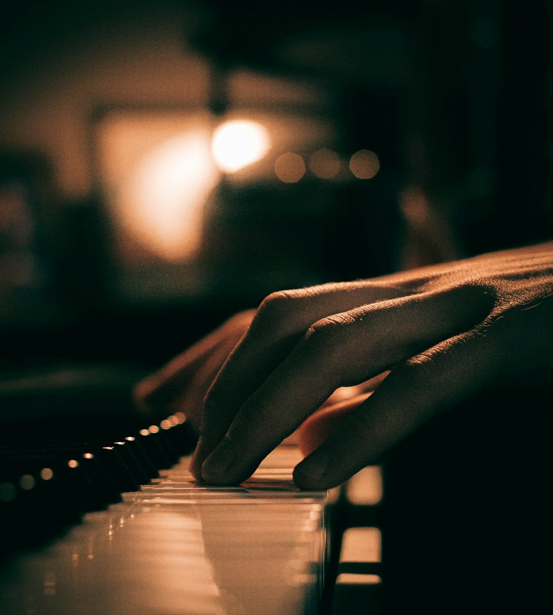 Piano keys in low light, cover art for the Filmy Dil Series Bollywood piano MIDI bundle