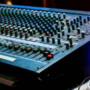 Mixing console close-up representing DR Halo Reverb plugin
